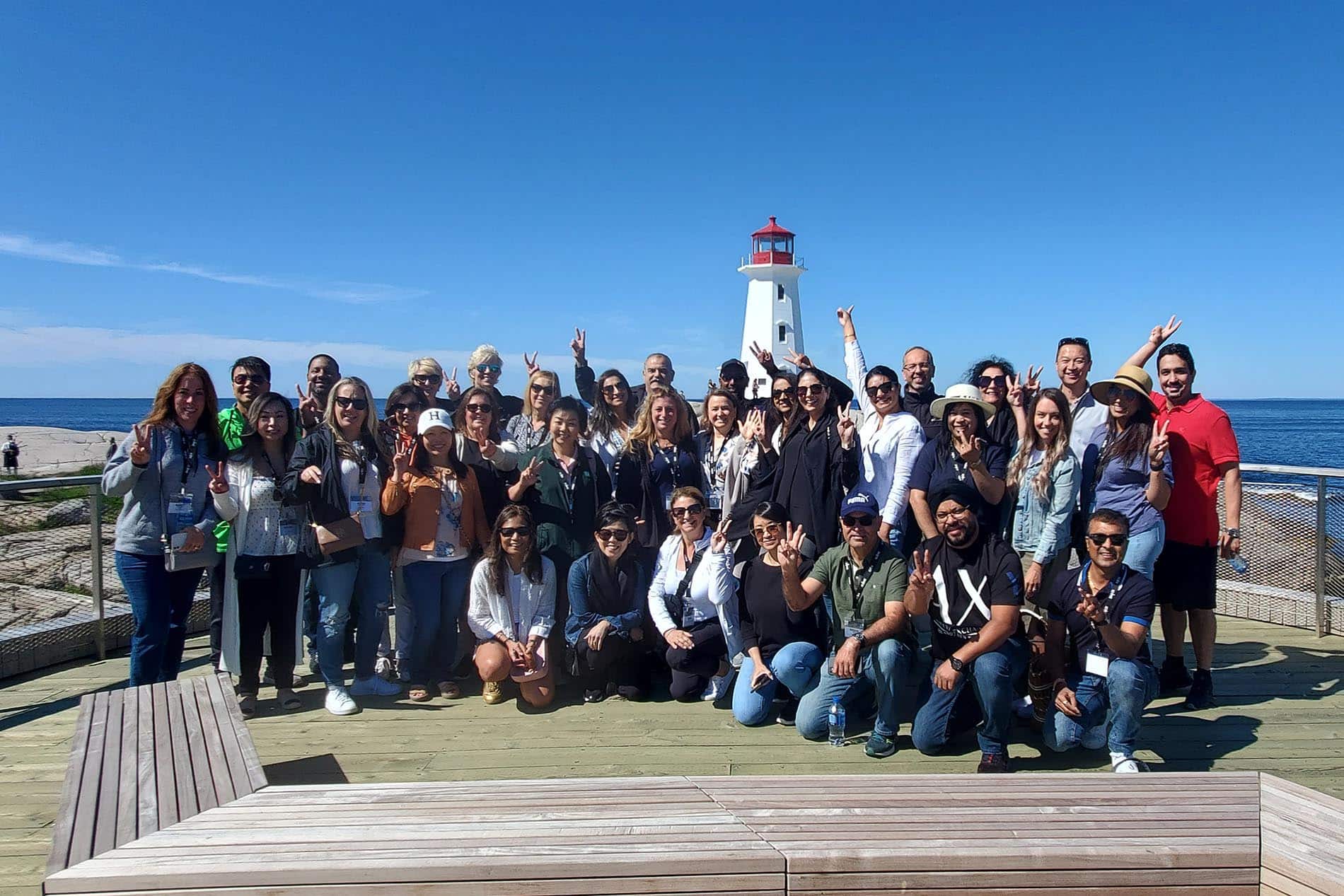 Guest gathered in Peggy's Cove for group picture